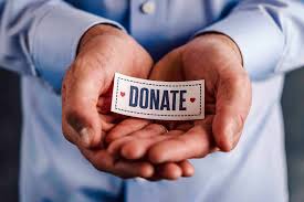 Hands holding a donation